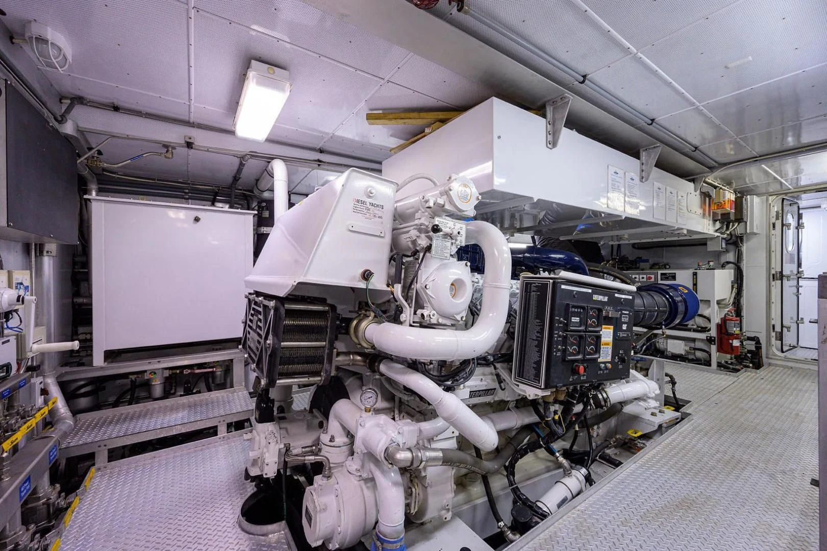 a large white machine in a factory aboard LEGACY Yacht for Sale