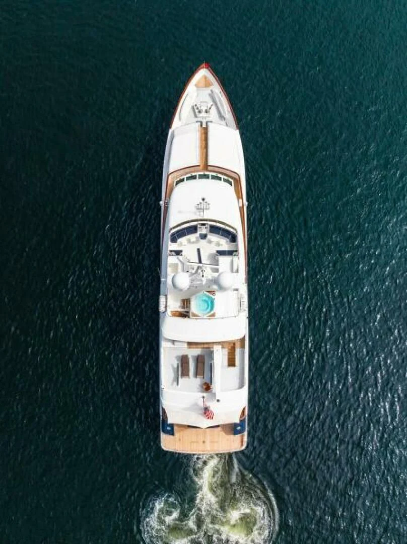 a toy boat on a body of water aboard LEGACY Yacht for Sale