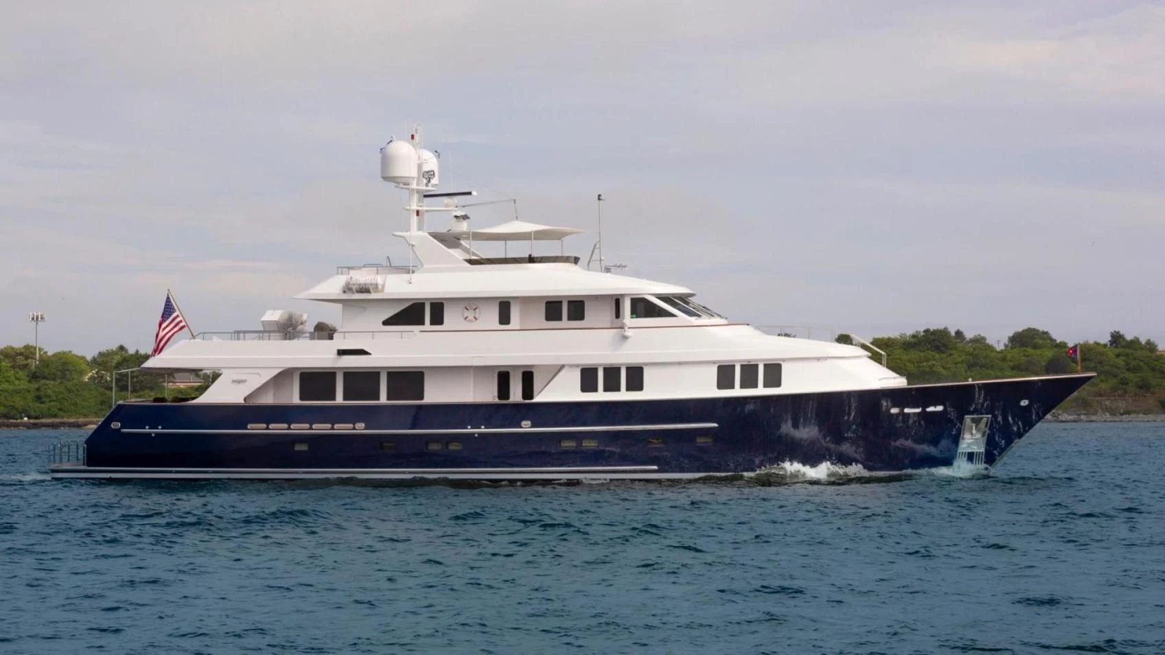 a large boat on the water aboard LEGACY Yacht for Sale
