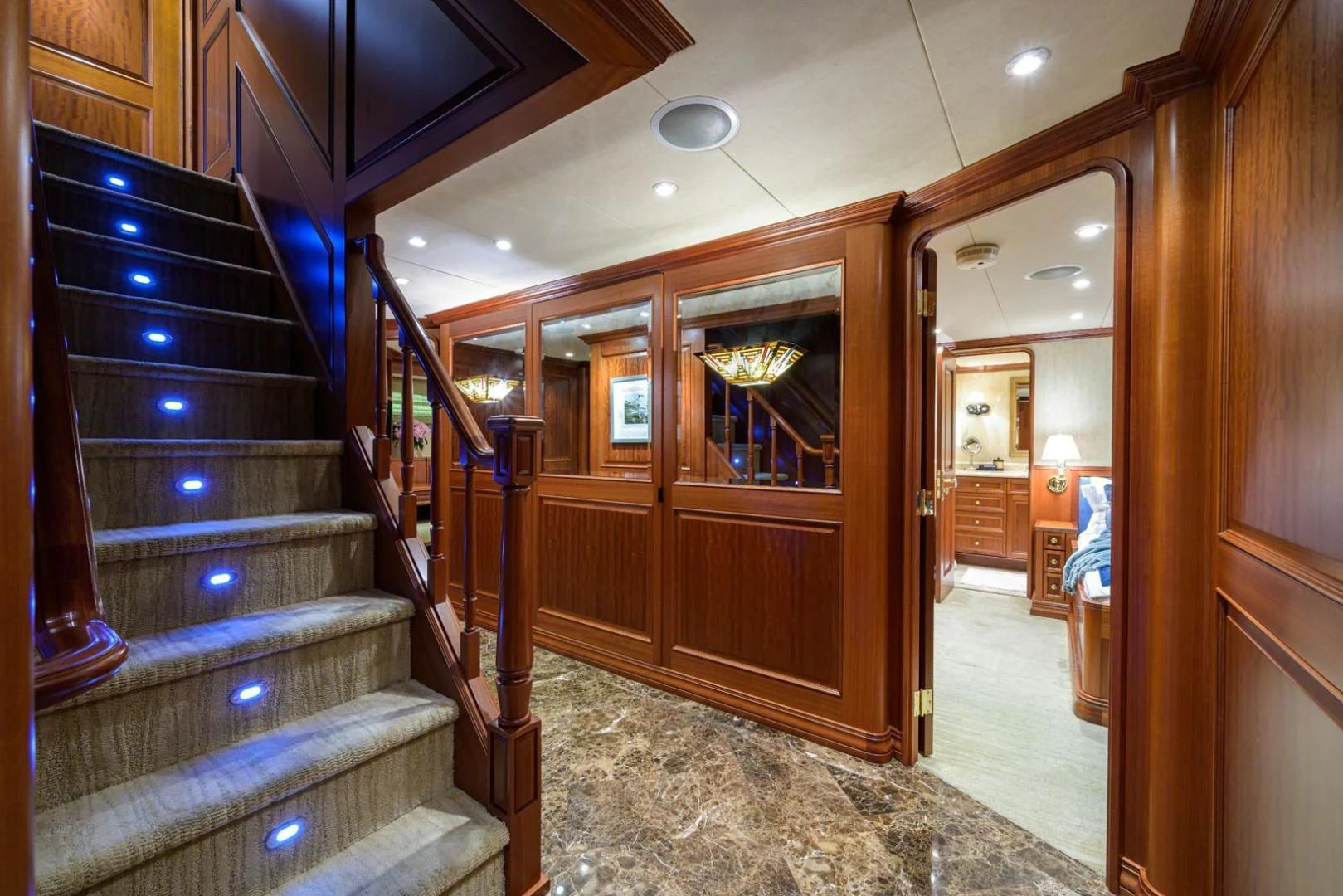 a room with a wood door and a wood door aboard LEGACY Yacht for Sale