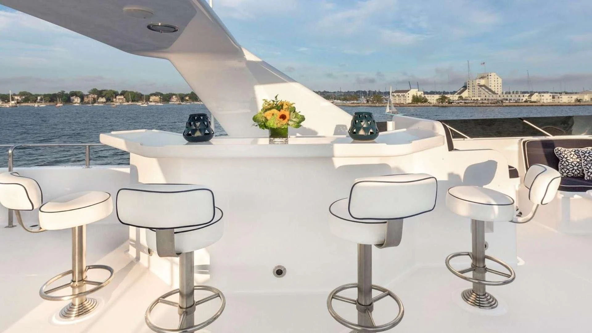 a table with chairs around it aboard LEGACY Yacht for Sale