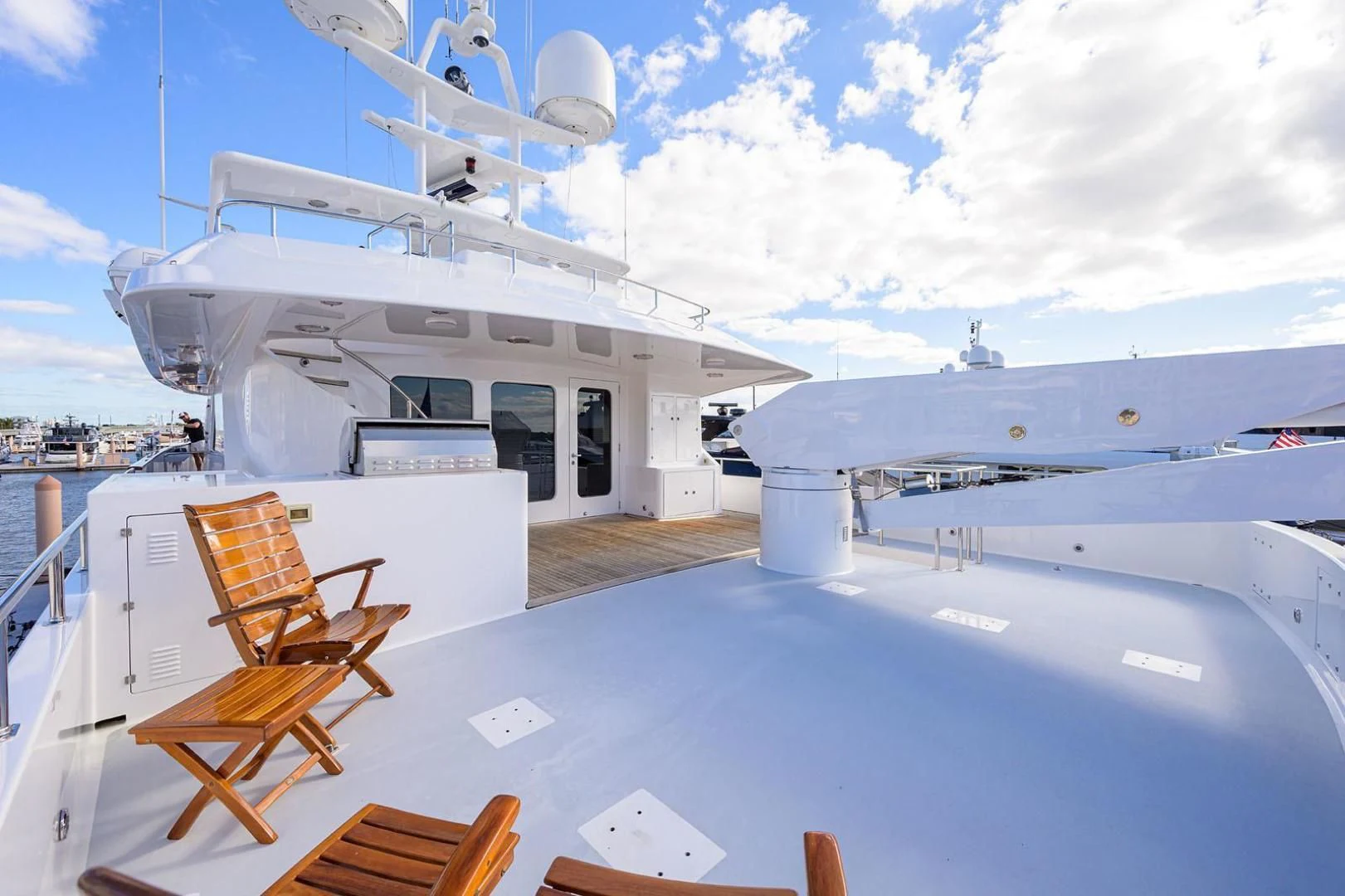 a large white ship docked aboard LEGACY Yacht for Sale