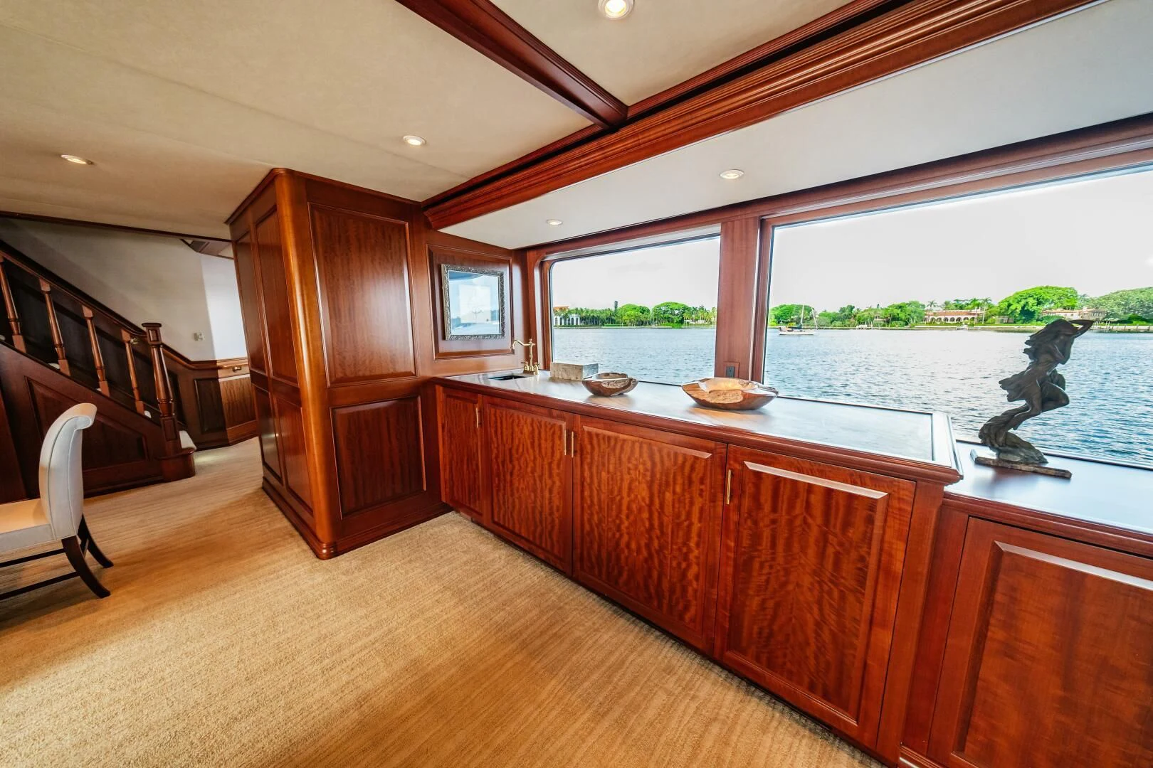 a kitchen with a large island aboard LEGACY Yacht for Sale