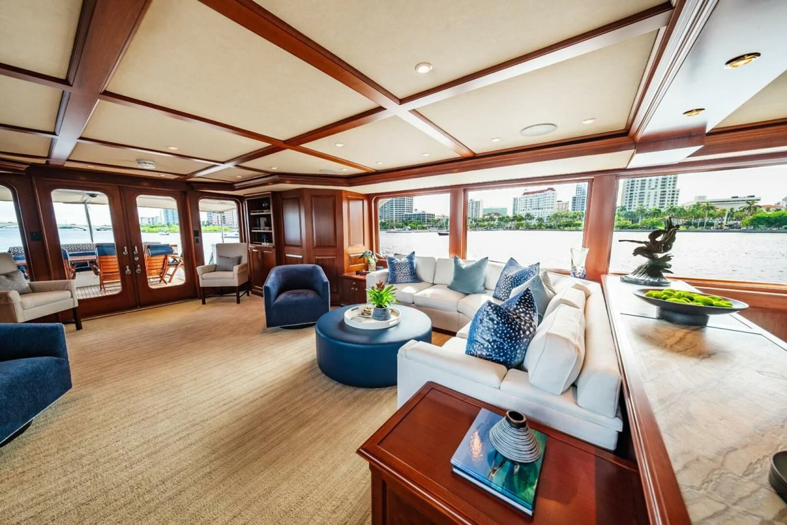 a living room with a large open window aboard LEGACY Yacht for Sale