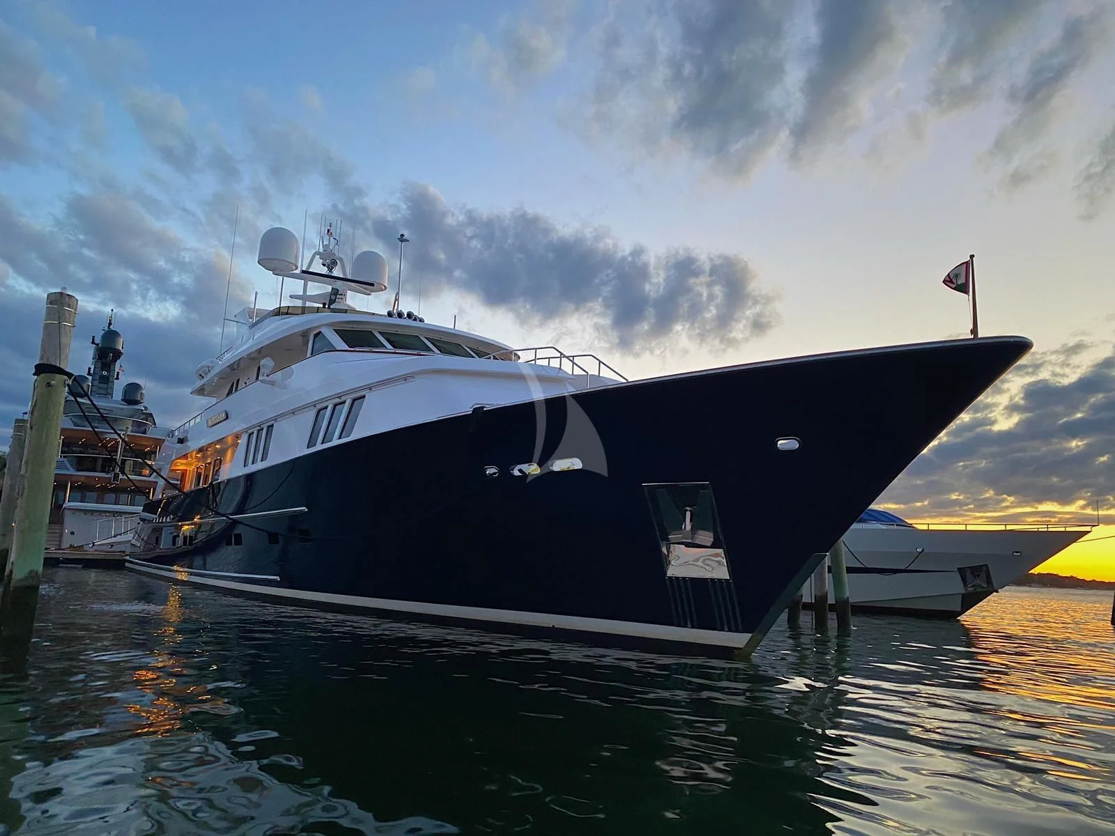 a boat docked at a dock aboard LEGACY Yacht for Sale