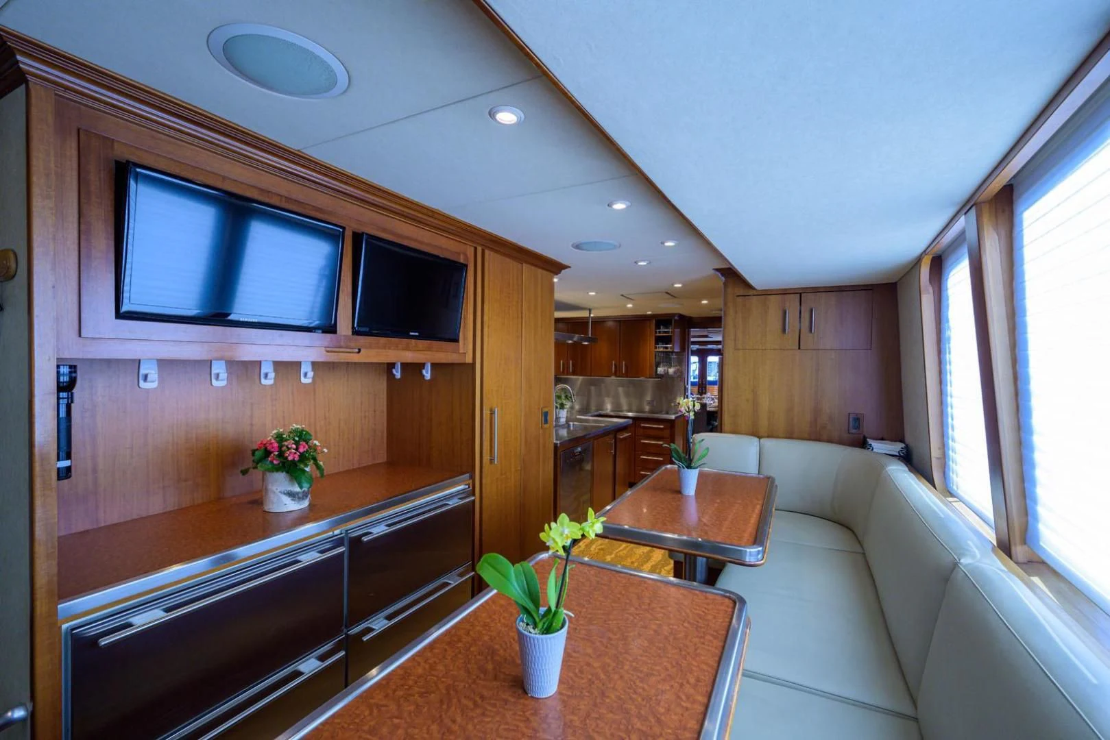 a modern looking living room aboard LEGACY Yacht for Sale