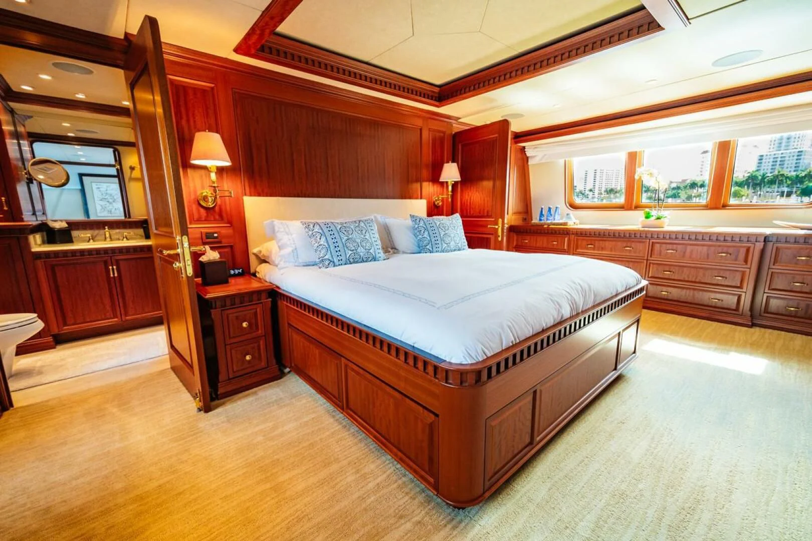 a bedroom with a large bed aboard LEGACY Yacht for Sale
