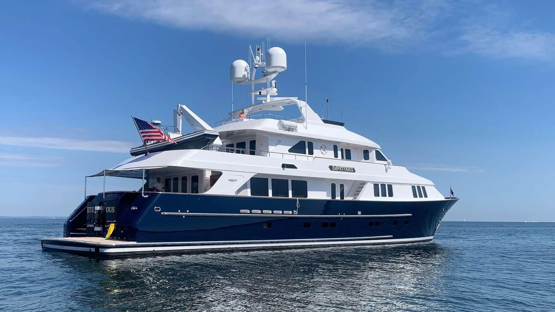 a large boat in the water aboard LEGACY Yacht for Sale