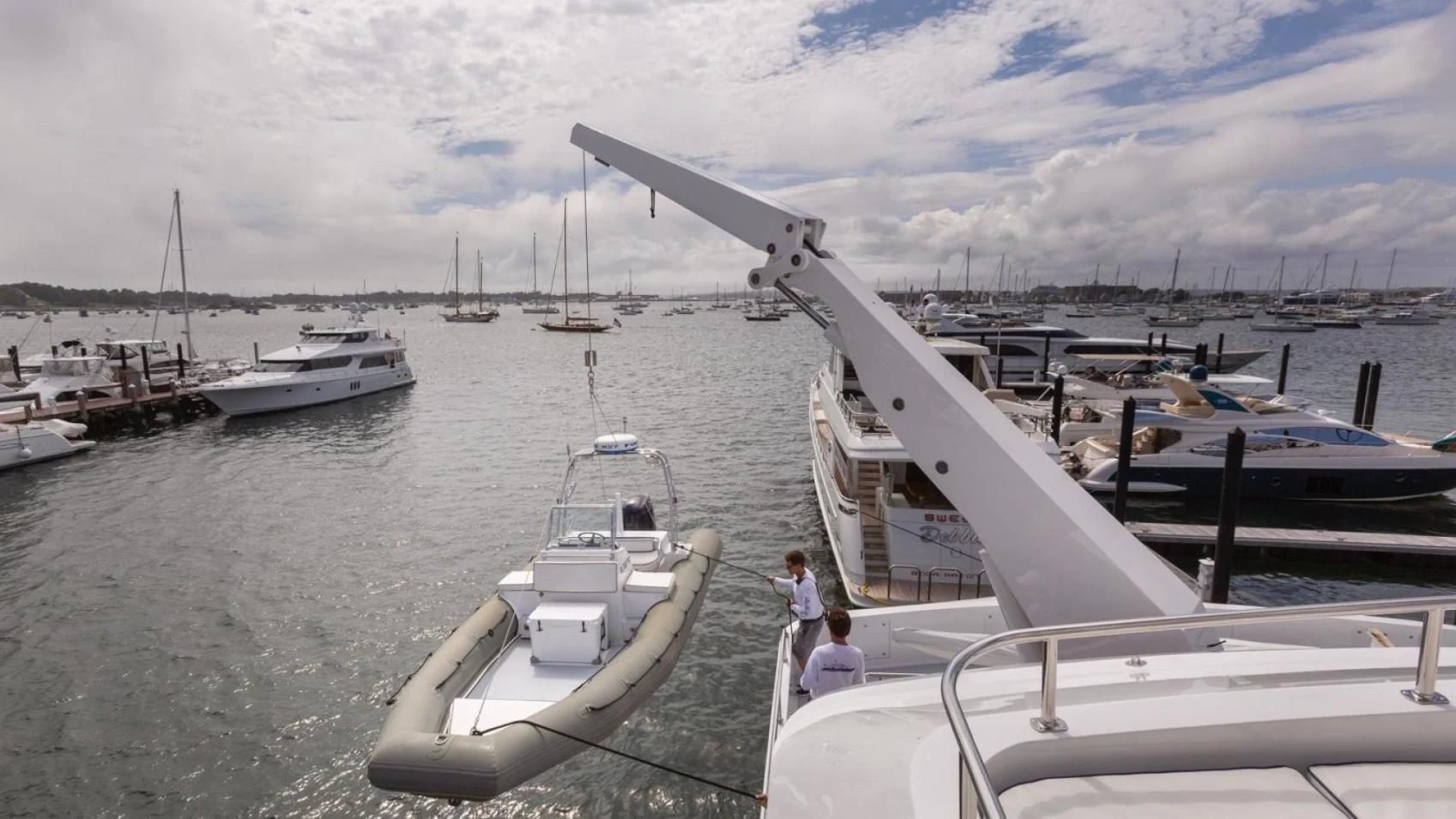 a group of people on a boat aboard LEGACY Yacht for Sale