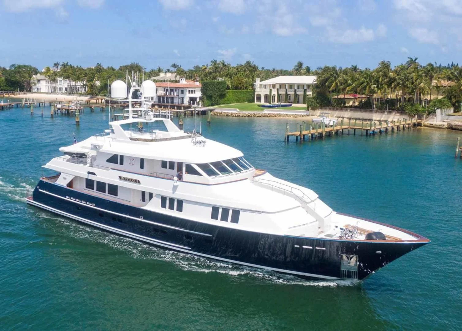 a large white yacht aboard LEGACY Yacht for Sale