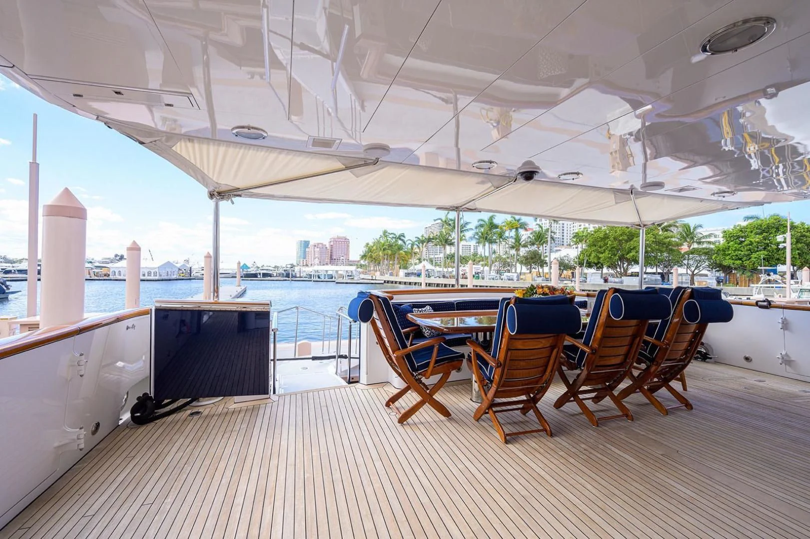 a group of chairs under a tent aboard LEGACY Yacht for Sale