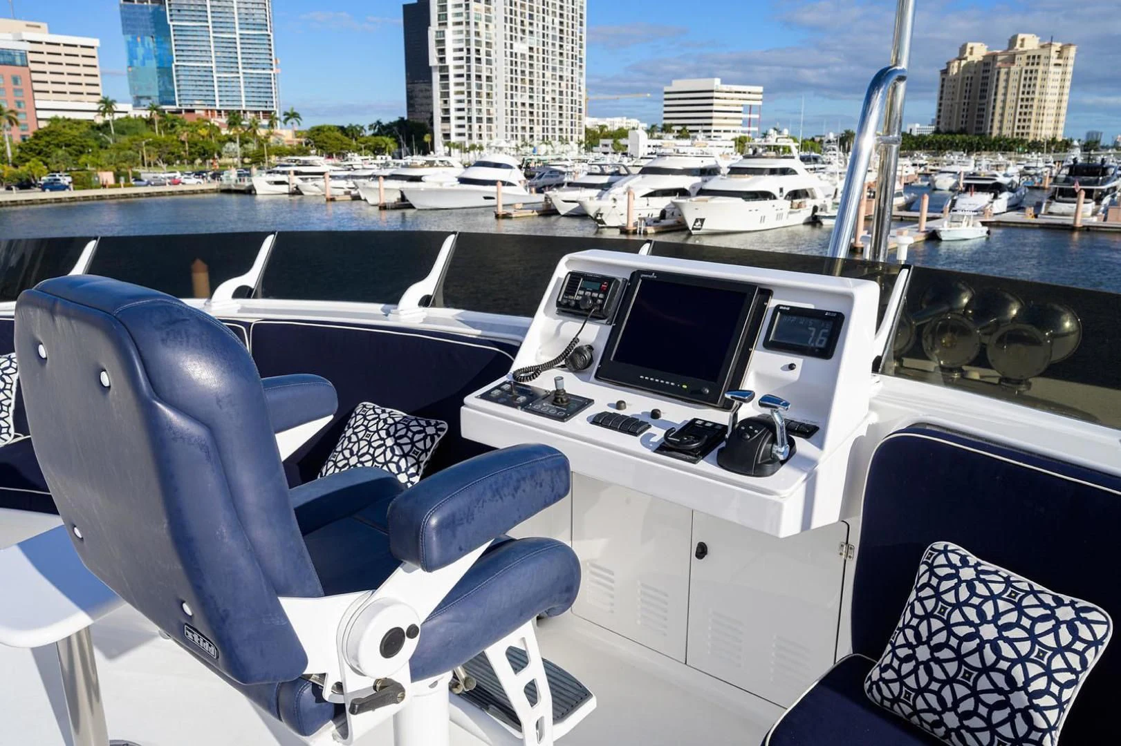 a boat with a screen and a chair on it aboard LEGACY Yacht for Sale