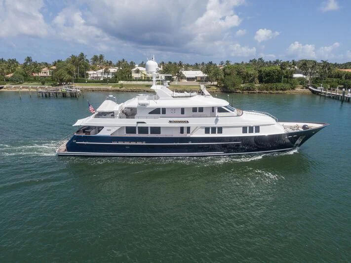 a large boat in the water aboard LEGACY Yacht for Sale