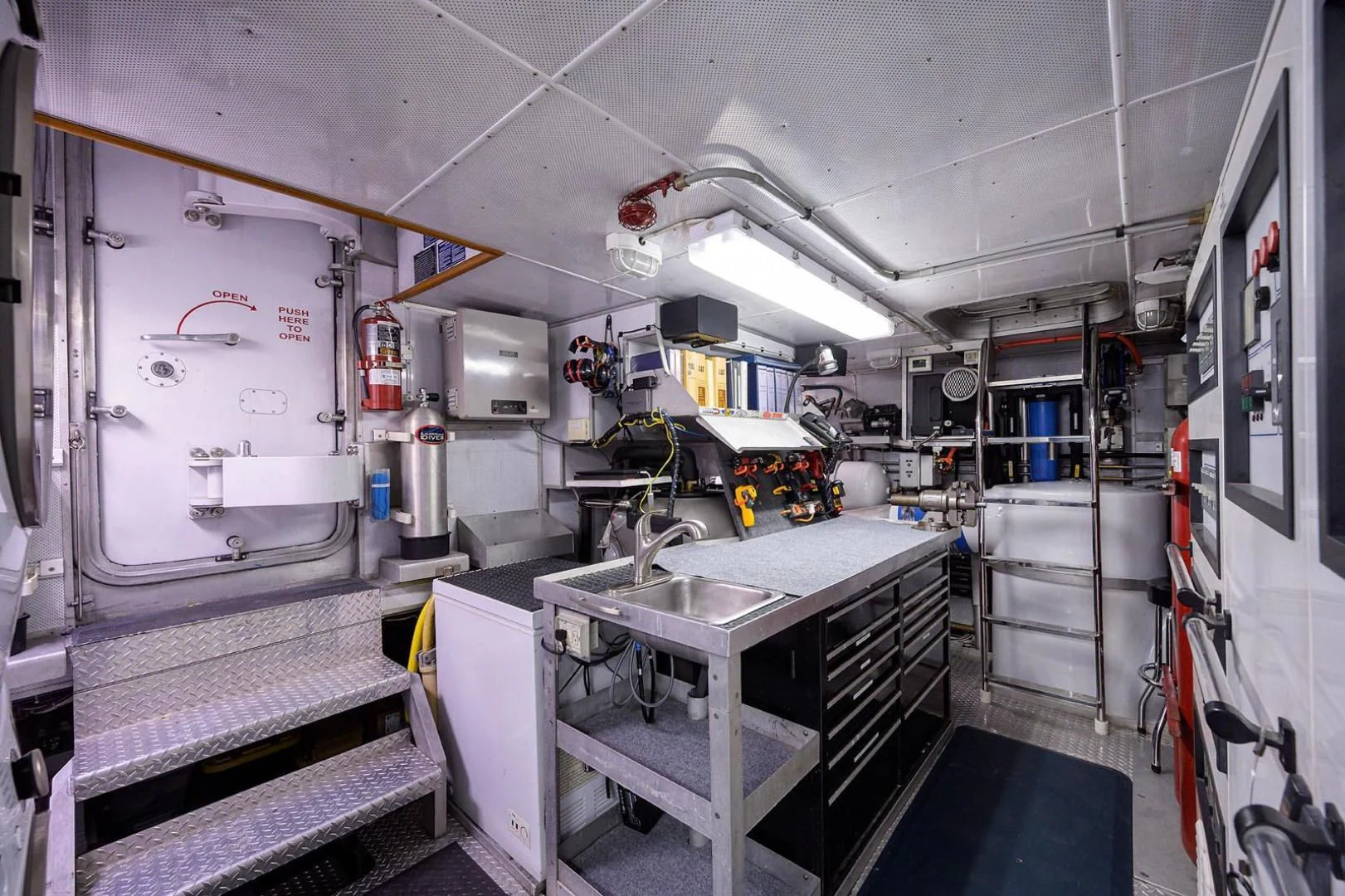 a room with a sink and a large machine aboard LEGACY Yacht for Sale
