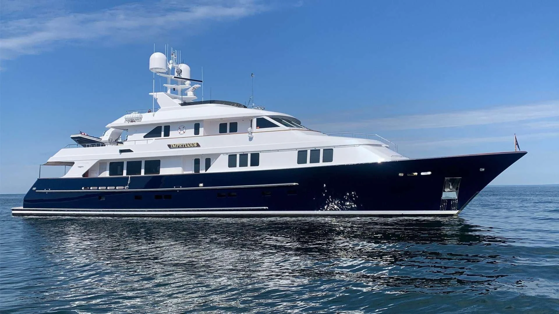 a large boat in the water aboard LEGACY Yacht for Sale