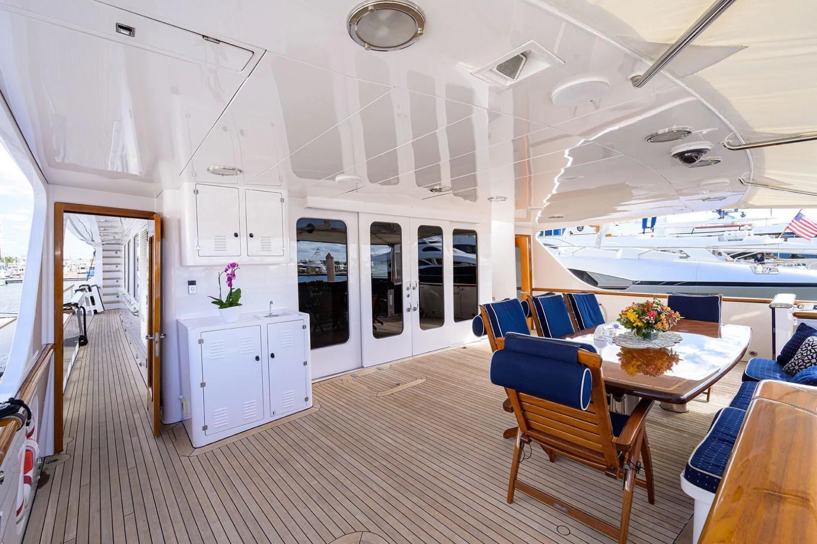 a kitchen and dining area aboard LEGACY Yacht for Sale