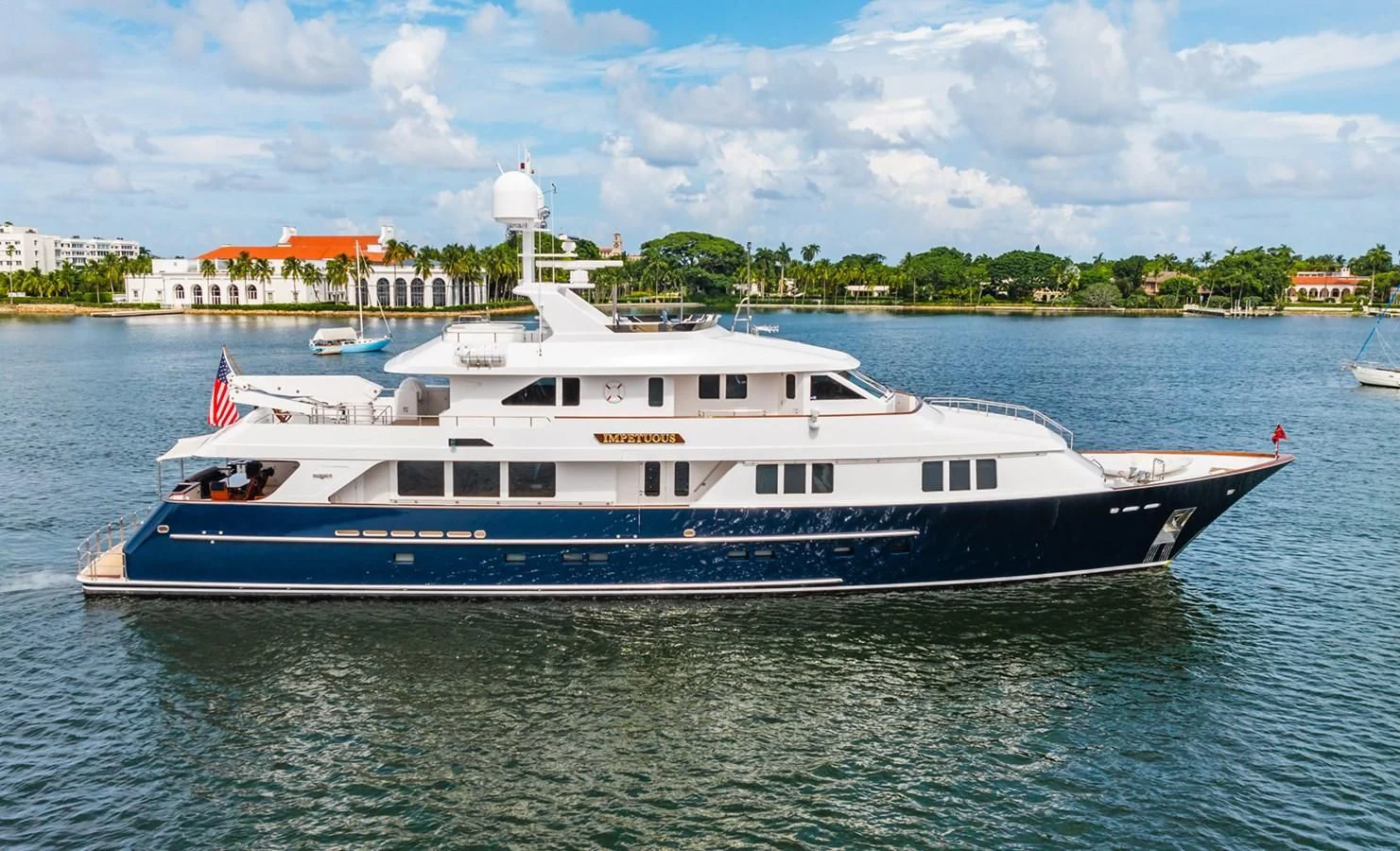 a large boat in the water aboard LEGACY Yacht for Sale