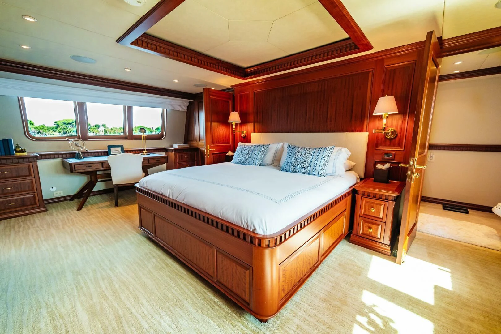 a large bedroom with a large bed aboard LEGACY Yacht for Sale