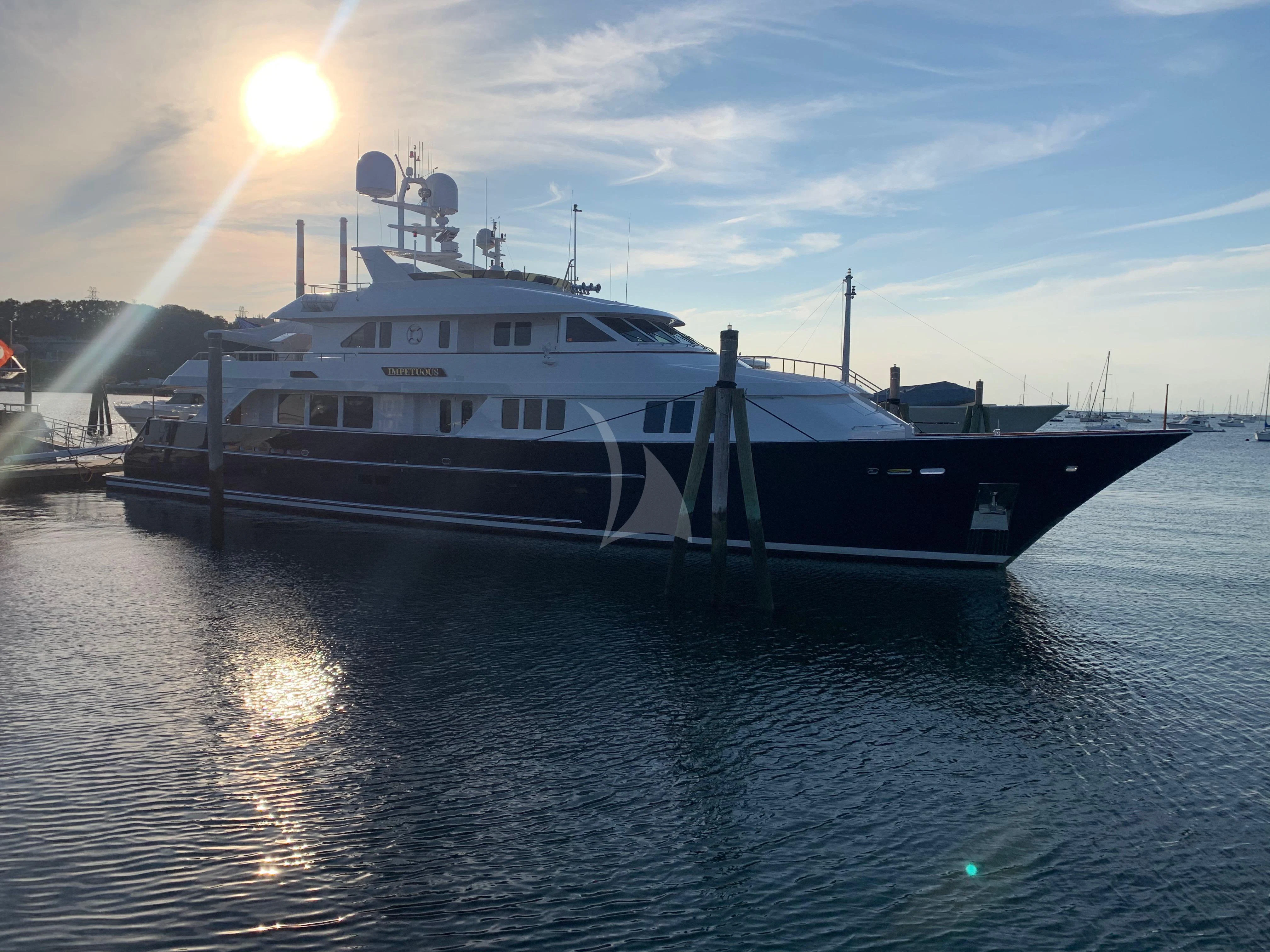 a large white boat in the water aboard LEGACY Yacht for Sale