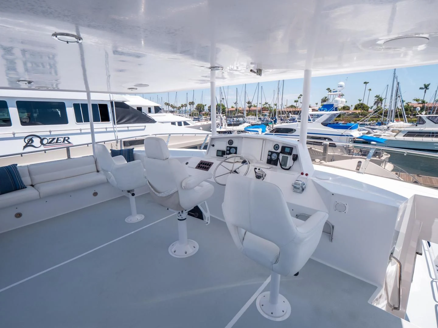 a white boat in a large room aboard LONE WOLF Yacht for Sale
