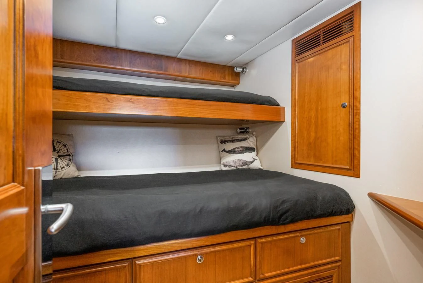 a dresser with a mirror above it aboard LONE WOLF Yacht for Sale