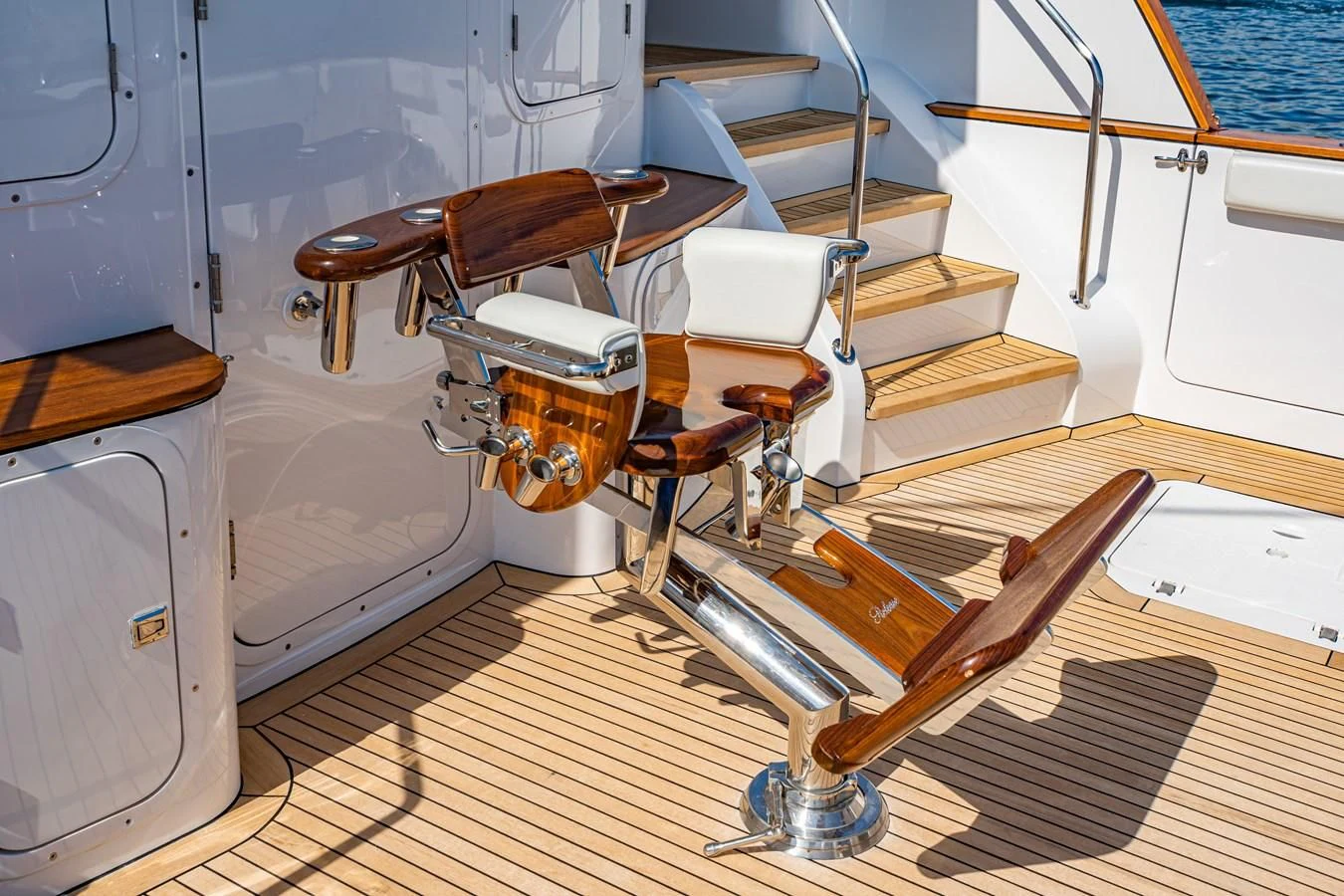 a wooden boat on a deck aboard LONE WOLF Yacht for Sale
