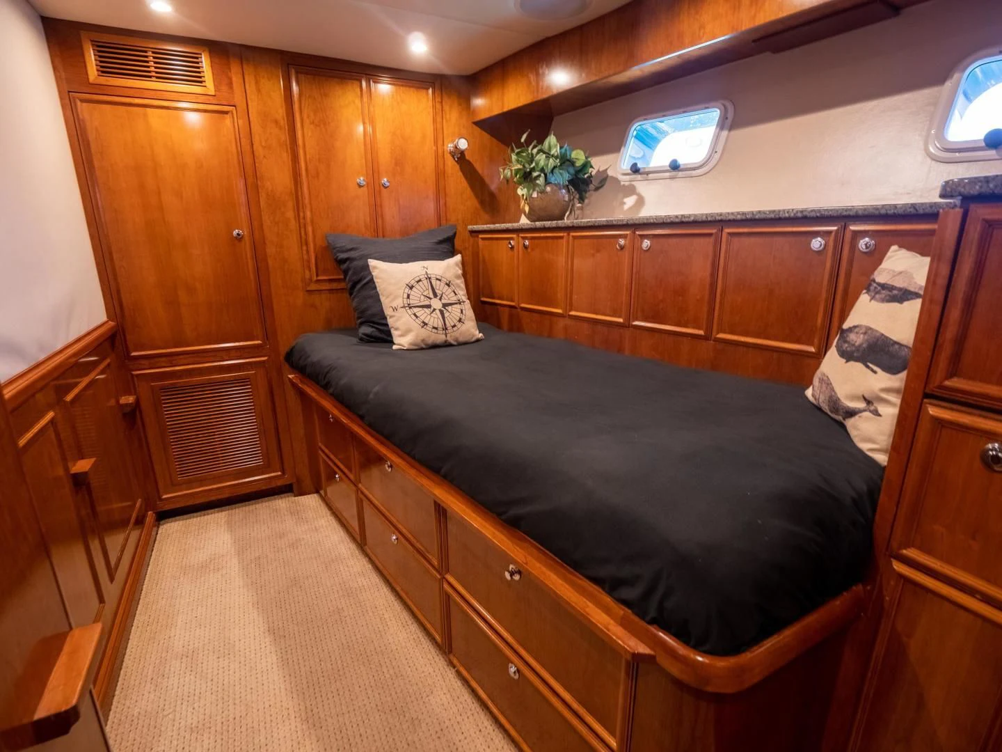 a bed in a room aboard LONE WOLF Yacht for Sale