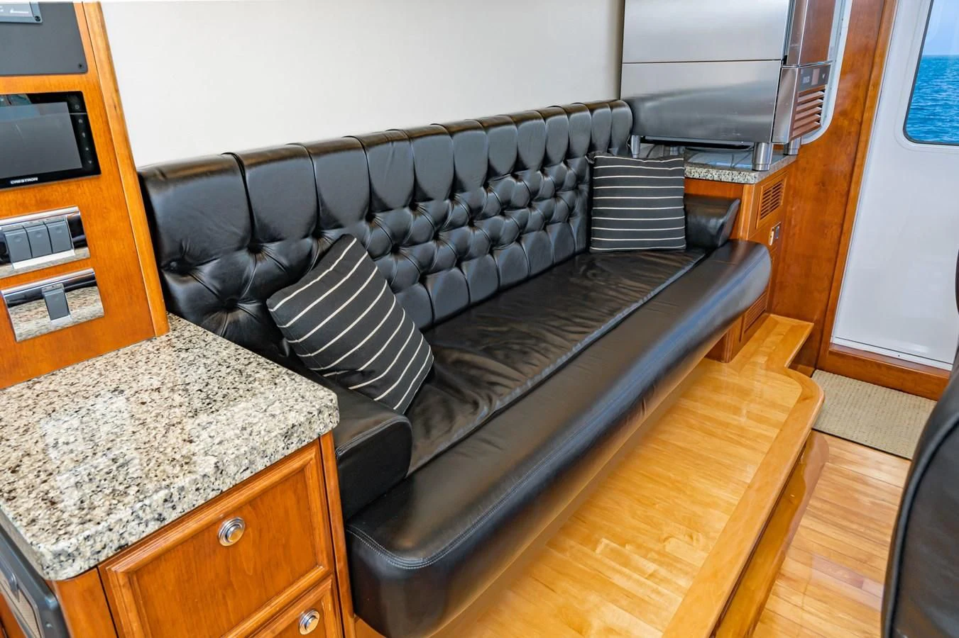 a couch in a living room aboard LONE WOLF Yacht for Sale