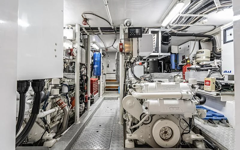 a room with several bicycles and a large machine aboard LONE WOLF Yacht for Sale