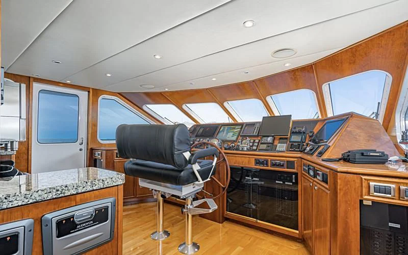a room with a desk and a chair aboard LONE WOLF Yacht for Sale