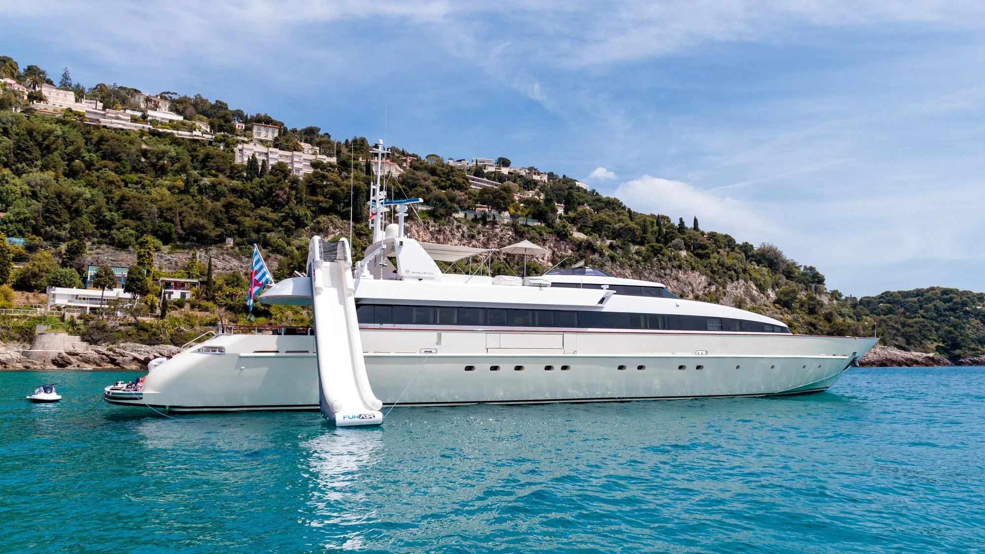 a large white yacht in the water aboard HEMILEA Yacht for Charter