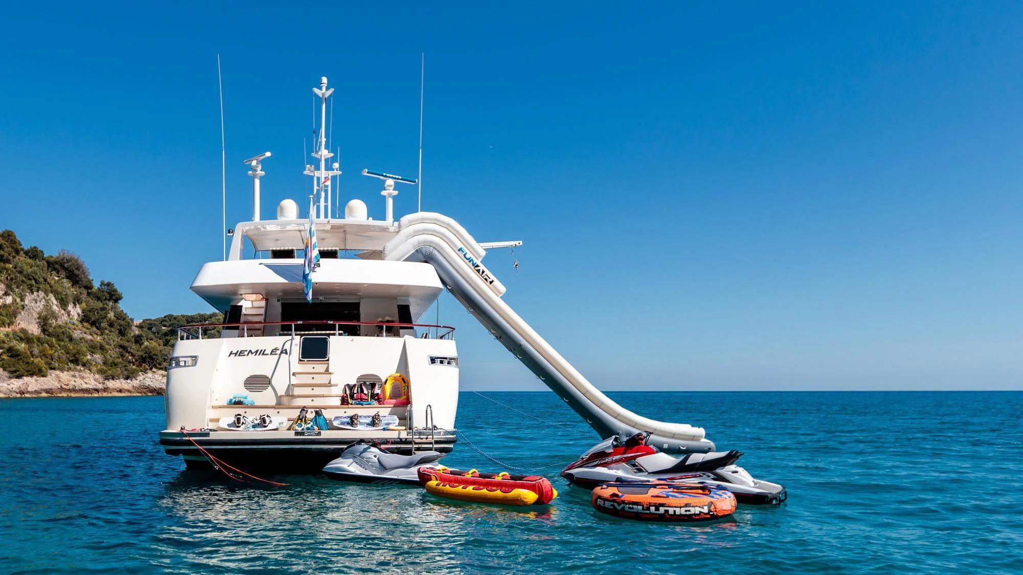a boat with a large antenna aboard HEMILEA Yacht for Charter