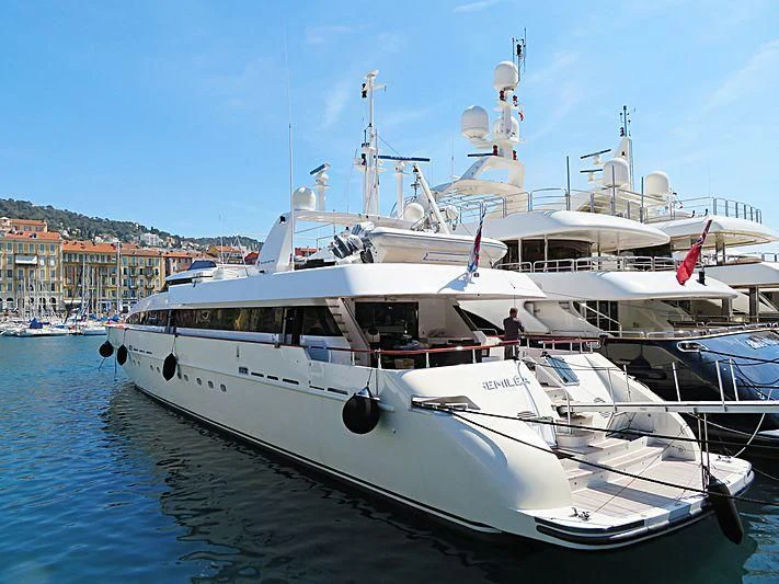 a boat docked at a pier aboard HEMILEA Yacht for Charter