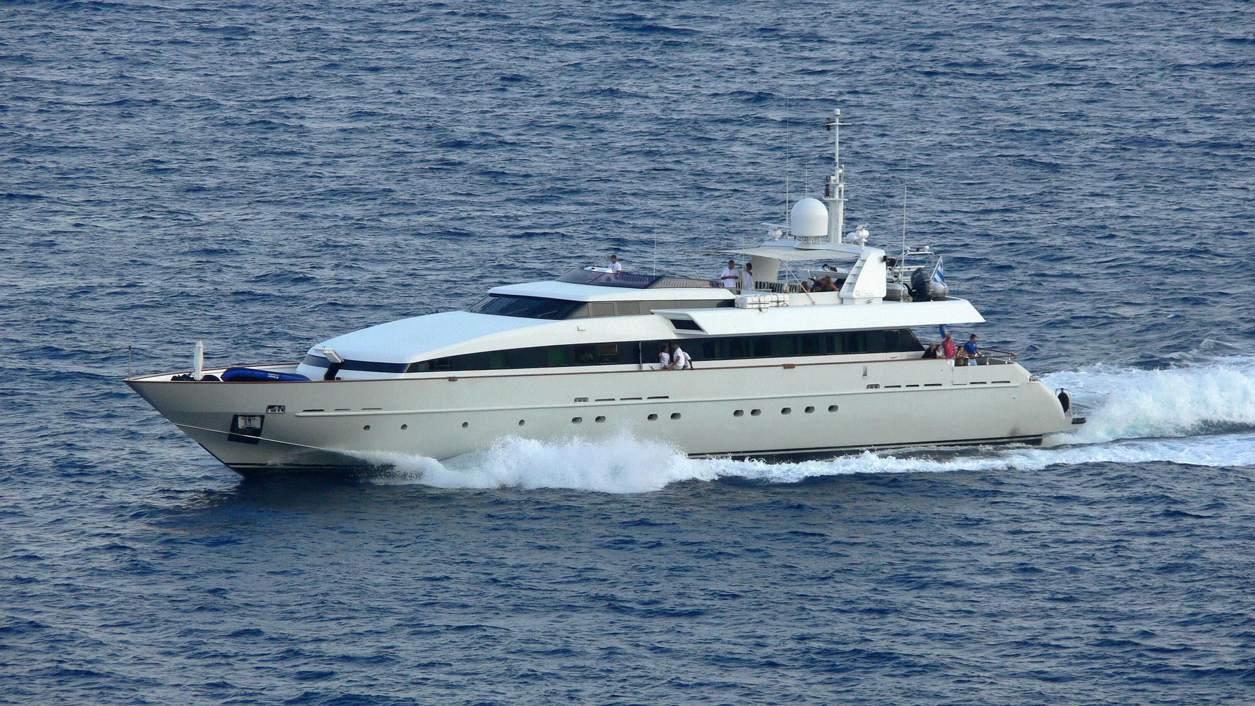 a white boat on the water aboard HEMILEA Yacht for Charter