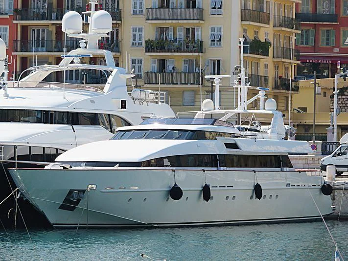 a group of boats in a harbor aboard HEMILEA Yacht for Charter