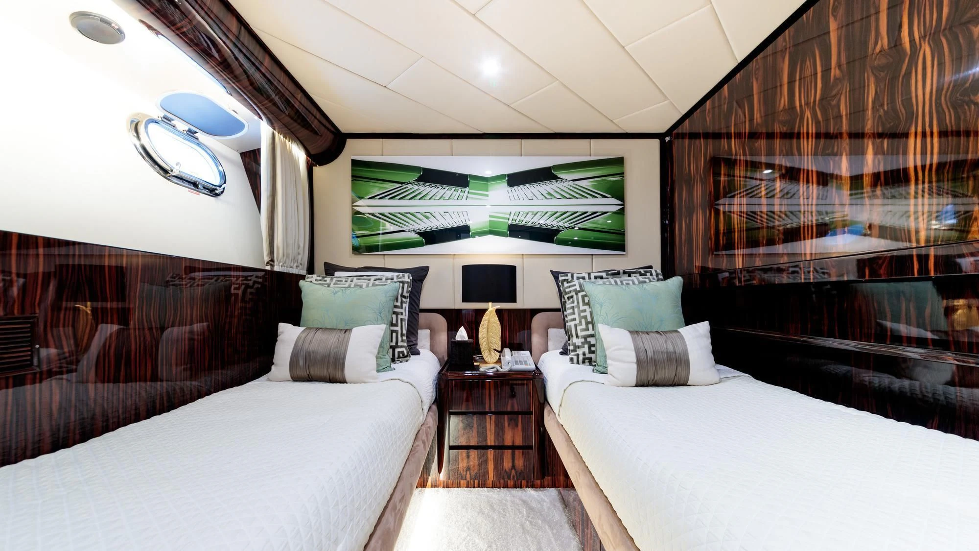 a room with two beds aboard HEMILEA Yacht for Charter
