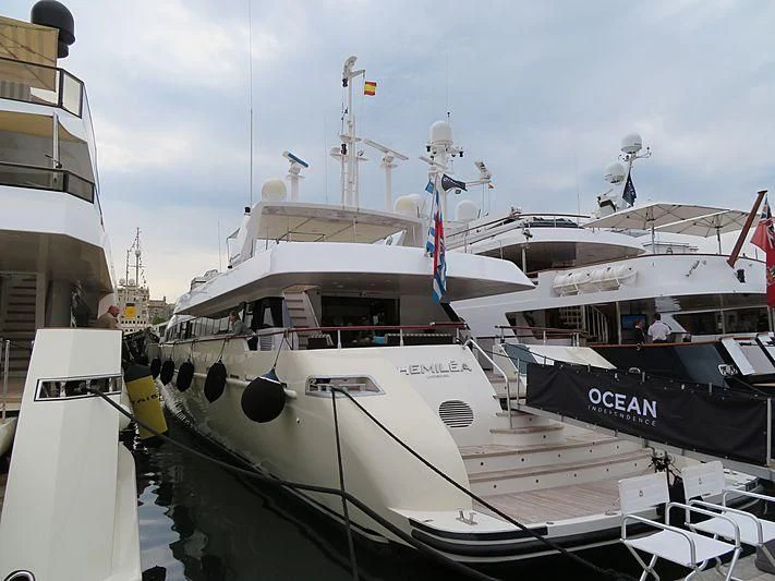 a group of boats in a harbor aboard HEMILEA Yacht for Charter