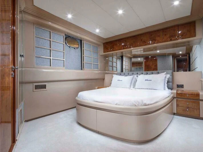 a bed in a room aboard BLANCO Yacht for Sale