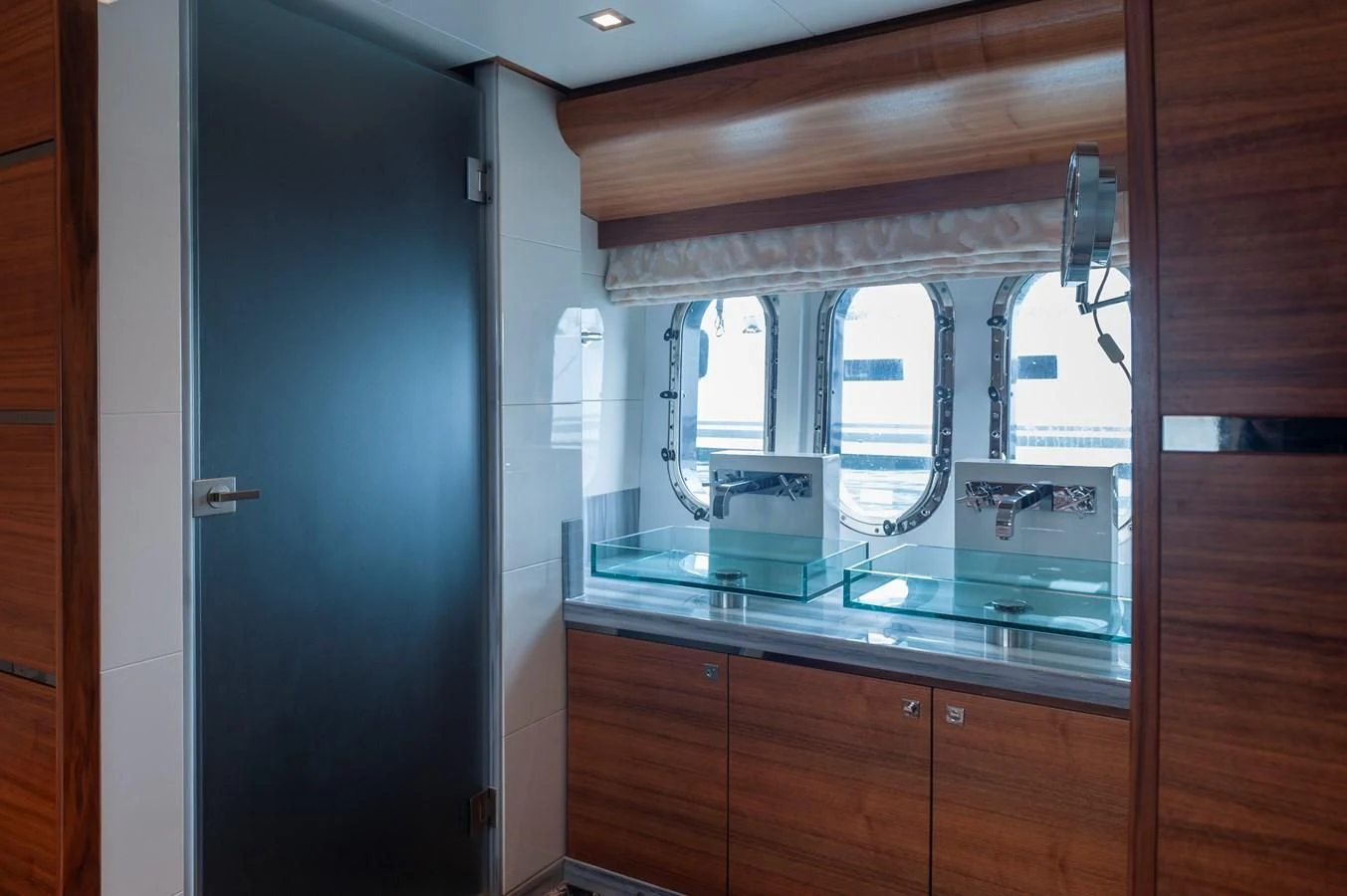 a room with a glass door aboard ANGELS Yacht for Sale