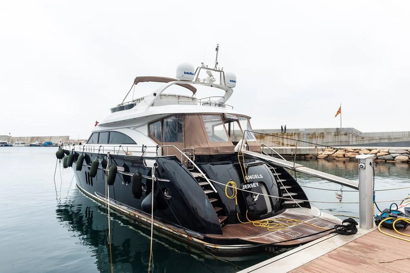 a boat docked at a pier aboard ANGELS Yacht for Sale