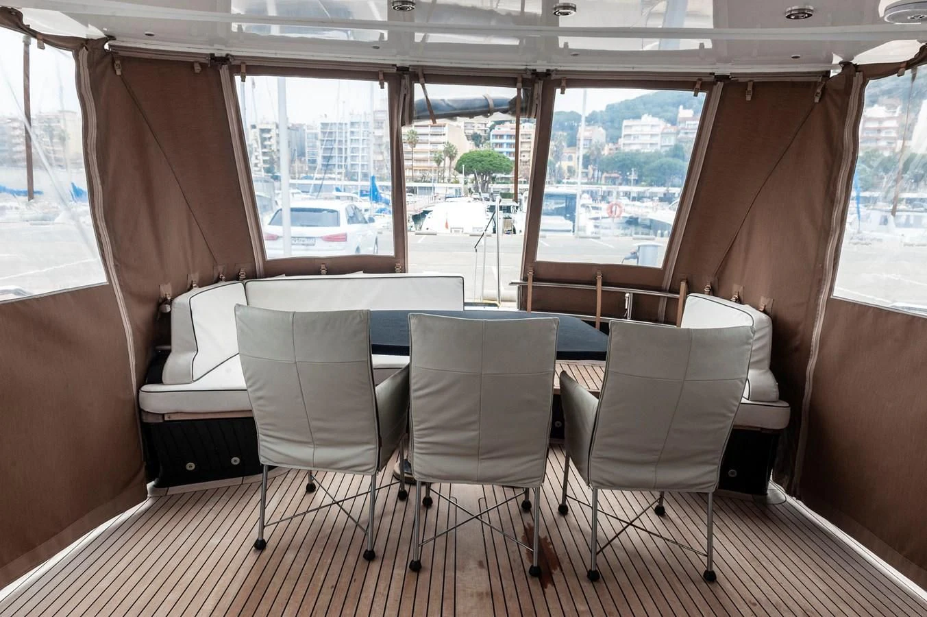a room with a table and chairs aboard ANGELS Yacht for Sale