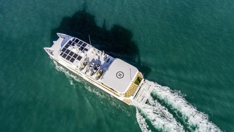 a large ship in the ocean aboard CHARLEY 2 Yacht for Sale