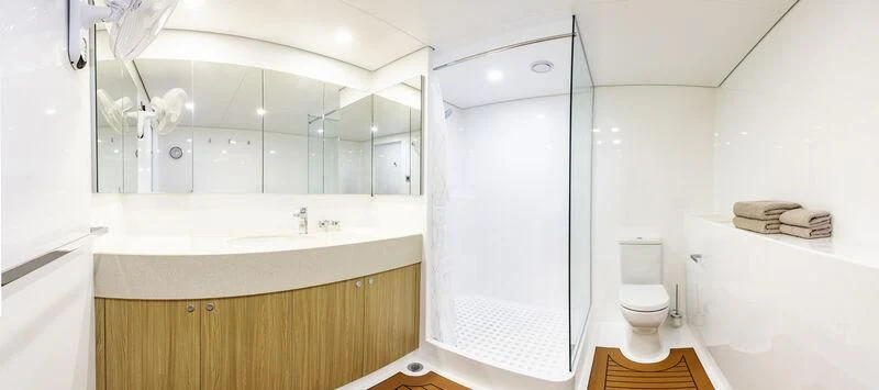 a bathroom with a shower and toilet aboard CHARLEY 2 Yacht for Sale