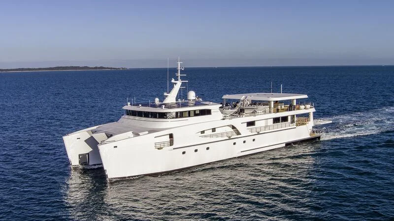 a large white boat in the water aboard CHARLEY 2 Yacht for Sale