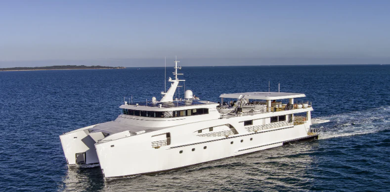 a large white boat in the water aboard CHARLEY 2 Yacht for Sale