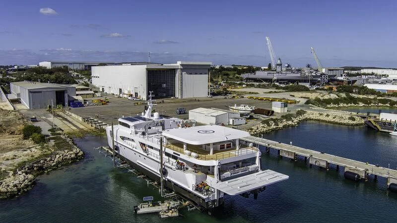 a large ship docked at a port aboard CHARLEY 2 Yacht for Sale