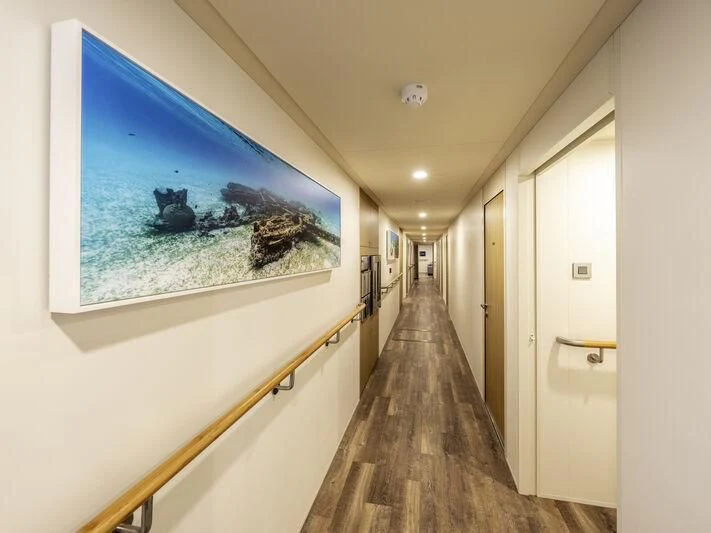 a hallway with a painting on the wall aboard CHARLEY 2 Yacht for Sale
