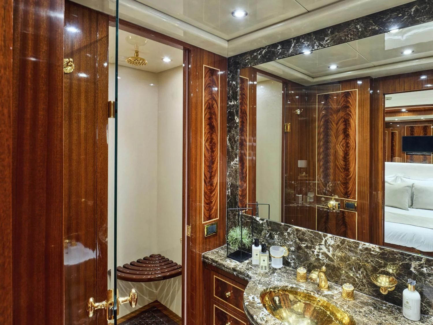 a bathroom with a large mirror aboard ABILITY Yacht for Sale