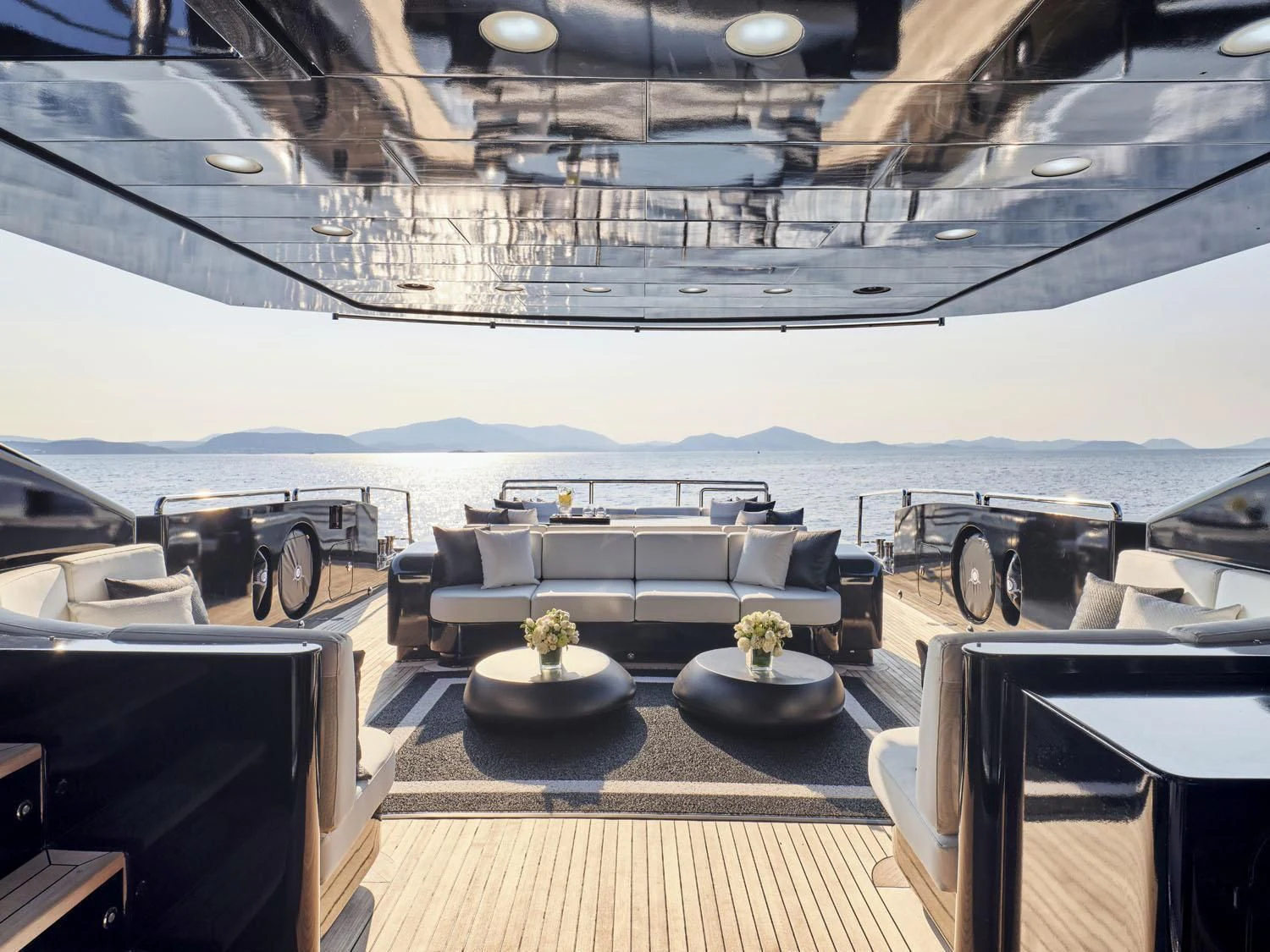 a room with a large table and chairs aboard ABILITY Yacht for Sale