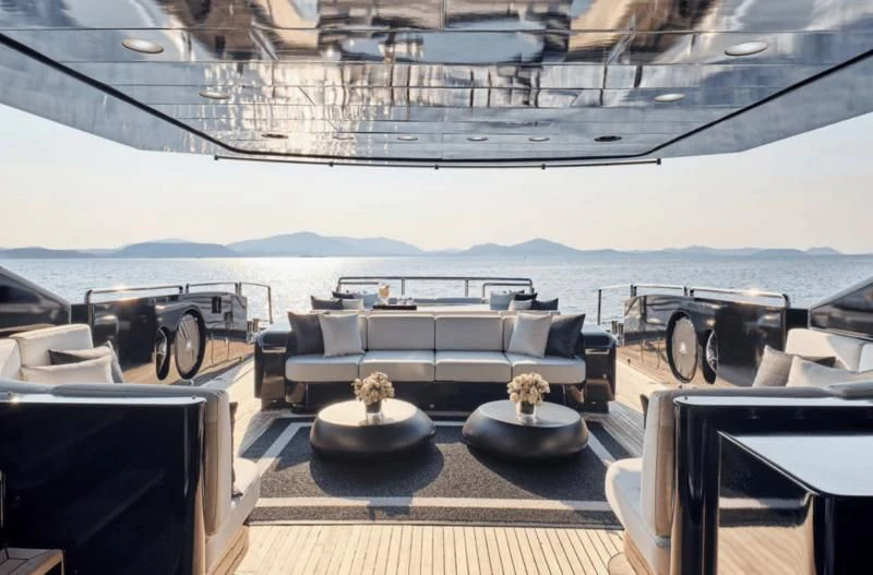 a room with a large window overlooking a body of water aboard ABILITY Yacht for Sale